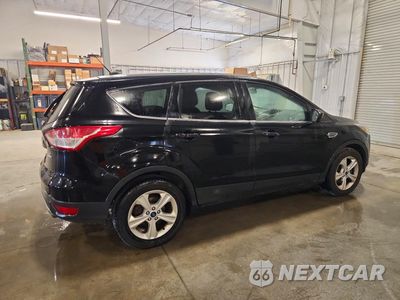 Trzecie zdjęcie samochodu z tyłu: 2016 FORD ESCAPE SE VIN:1FMCU9GX6GUC11677 - miniatura