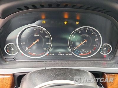 Zdjęcie 9 z 12 samochodu: 2014 BMW 750 LI VIN:WBAYE8C55ED134249 - miniatura