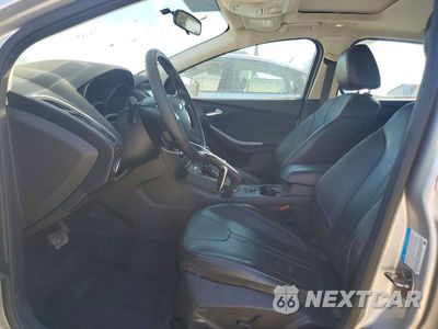 Zdjęcie 7 z 12 samochodu: 2013 FORD FOCUS TITANIUM VIN:1FADP3N2XDL370343 - miniatura