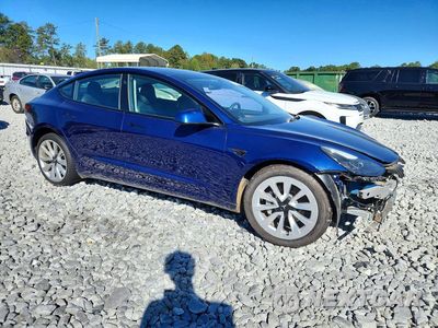 Czwarte zdjęcie samochodu z boku: 2023 TESLA MODEL 3 VIN:5YJ3E1EA7PF436314 - miniatura