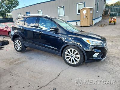 Czwarte zdjęcie samochodu z boku: 2017 FORD ESCAPE TITANIUM VIN:1FMCU9JDXHUC42303 - miniatura