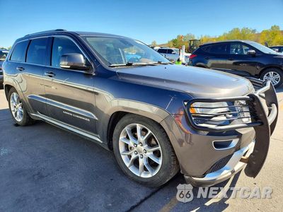 Czwarte zdjęcie samochodu z boku: 2015 JEEP GRAND CHEROKEE SUMMIT VIN:1C4RJFJM1FC880092 - miniatura
