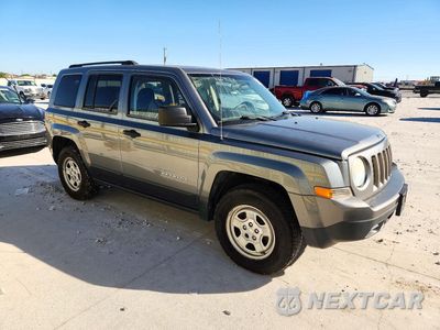 Czwarte zdjęcie samochodu z boku: 2014 JEEP PATRIOT SPORT VIN:1C4NJRBBXED529123 - miniatura