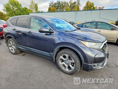 Czwarte zdjęcie samochodu z boku: 2017 HONDA CR-V EXL VIN:2HKRW2H8XHH676157 - miniatura