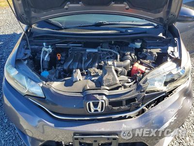 Zdjęcie 12 z 13 samochodu: 2016 HONDA FIT EX VIN:JHMGK5H7XGX032543 - miniatura