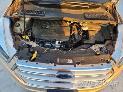 Zdjęcie 12 z 13 samochodu: 2017 FORD ESCAPE TITANIUM VIN:1FMCU0JD3HUE46856 - miniatura