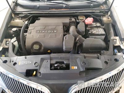Zdjęcie 11 z 13 samochodu: 2014 LINCOLN MKS VIN:1LNHL9EK7EG611954 - miniatura