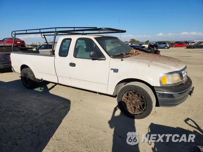 Czwarte zdjęcie samochodu z boku: 1999 FORD F150 VIN:1FTRX17W2XNC31787 - miniatura
