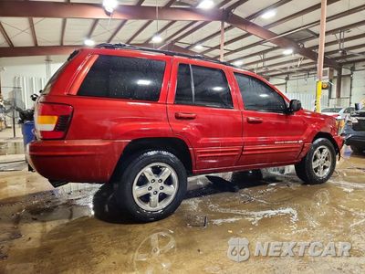 Trzecie zdjęcie samochodu z tyłu: 2003 JEEP GRAND CHEROKEE OVERLAND VIN:1J8GW68J53C573131 - miniatura