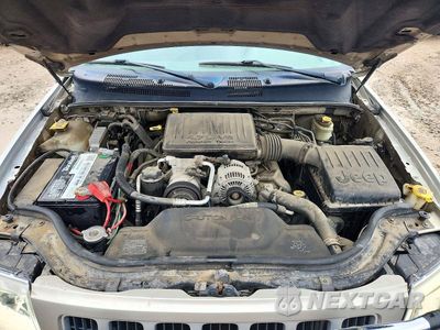 Zdjęcie 11 z 12 samochodu: 2004 JEEP GRAND CHEROKEE LAREDO VIN:1J4GW48N24C328832 - miniatura