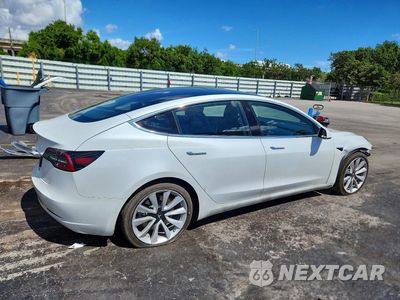 Trzecie zdjęcie samochodu z tyłu: 2019 TESLA MODEL 3 VIN:5YJ3E1EA3KF447948 - miniatura