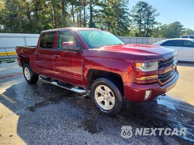 Czwarte zdjęcie samochodu z boku: 2016 CHEVROLET SILVERADO K1500 LT VIN:3GCUKREC1GG141183 - miniatura