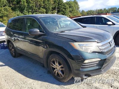 Czwarte zdjęcie samochodu z boku: 2016 HONDA PILOT LX VIN:5FNYF5H12GB030995 - miniatura
