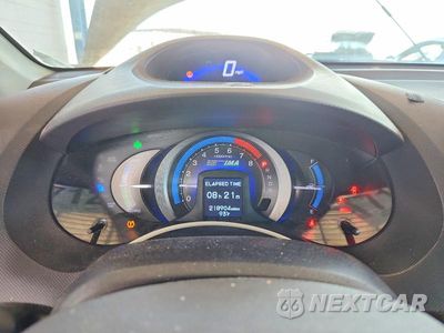 Zdjęcie 9 z 13 samochodu: 2010 HONDA INSIGHT EX VIN:JHMZE2H75AS043436 - miniatura