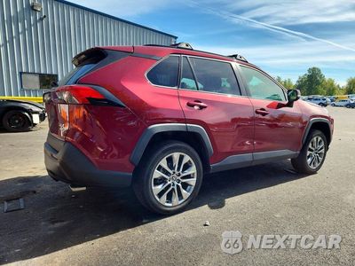 Trzecie zdjęcie samochodu z tyłu: 2021 TOYOTA RAV4 XLE PREMIUM VIN:2T3A1RFV0MW247318 - miniatura