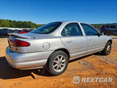 Trzecie zdjęcie samochodu z tyłu: 2000 FORD CONTOUR SE SPORT VIN:1FAFP66L5YK129920 - miniatura
