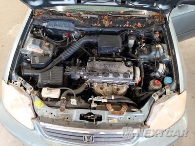 Zdjęcie 11 z 12 samochodu: 2000 HONDA CIVIC LX VIN:1HGEJ6678YL043524 - miniatura