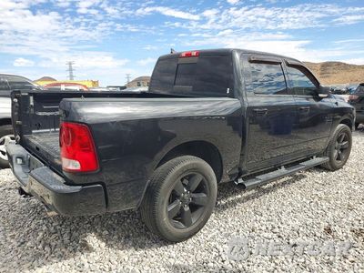 Trzecie zdjęcie samochodu z tyłu: 2018 RAM 1500 SLT VIN:1C6RR6LTXJS132878 - miniatura