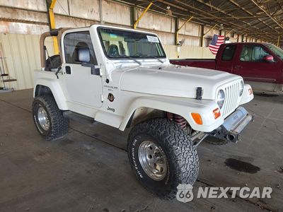 Czwarte zdjęcie samochodu z boku: 1999 JEEP WRANGLER / TJ SAHARA VIN:1J4FY49SXXP444643 - miniatura