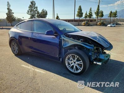 Czwarte zdjęcie samochodu z boku: 2024 TESLA MODEL Y VIN:7SAYGDED1RF001905 - miniatura