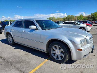 Czwarte zdjęcie samochodu z boku: 2005 CHRYSLER 300 TOURING VIN:2C3JA53G75H595668 - miniatura