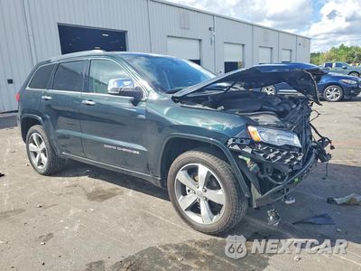 Czwarte zdjęcie samochodu z boku: 2014 JEEP GRAND CHEROKEE OVERLAND VIN:1C4RJECGXEC424351 - miniatura