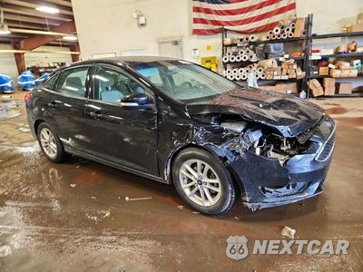 Czwarte zdjęcie samochodu z boku: 2016 FORD FOCUS SE VIN:1FADP3F26GL216702 - miniatura
