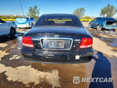 Zdjęcie 6 z 12 samochodu: 2002 HYUNDAI SONATA BASE VIN:KMHWF25HX2A666083 - miniatura