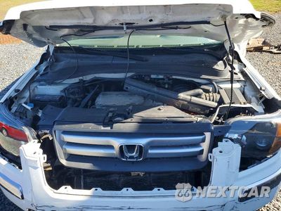 Zdjęcie 12 z 13 samochodu: 2006 HONDA PILOT EX VIN:5FNYF18566B009335 - miniatura