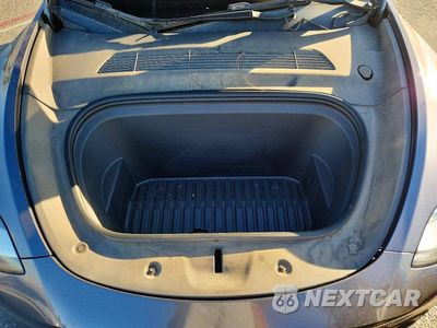 Zdjęcie 12 z 13 samochodu: 2022 TESLA MODEL Y VIN:7SAYGDEE3NF371935 - miniatura