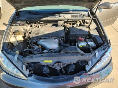 Zdjęcie 11 z 12 samochodu: 2003 TOYOTA CAMRY LE VIN:4T1BE32K33U718712 - miniatura