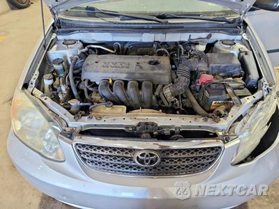 Zdjęcie 11 z 12 samochodu: 2006 TOYOTA COROLLA CE VIN:JTDBR32E260087787 - miniatura