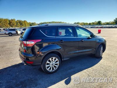 Trzecie zdjęcie samochodu z tyłu: 2017 FORD ESCAPE TITANIUM VIN:1FMCU9J93HUE52205 - miniatura