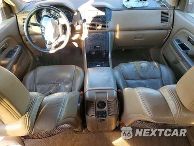 Zdjęcie 8 z 13 samochodu: 2004 HONDA PILOT EXL VIN:2HKYF18604H612823 - miniatura