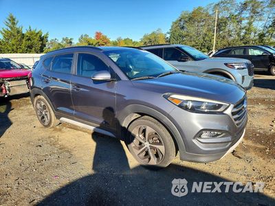 Czwarte zdjęcie samochodu z boku: 2018 HYUNDAI TUCSON VALUE VIN:KM8J3CA27JU691773 - miniatura