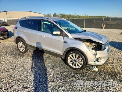 Czwarte zdjęcie samochodu z boku: 2017 FORD ESCAPE TITANIUM VIN:1FMCU0J99HUC18727 - miniatura