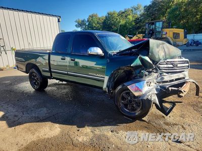 Czwarte zdjęcie samochodu z boku: 2002 TOYOTA TUNDRA SR5 VIN:5TBRN341X2S272609 - miniatura