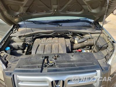 Zdjęcie 12 z 13 samochodu: 2006 HONDA PILOT EX VIN:5FNYF28536B042072 - miniatura