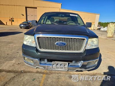 Piąte zdjęcie samochodu w środku: 2004 FORD F150 VIN:1FTPX12504NC01575 - miniatura