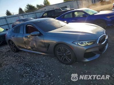 Czwarte zdjęcie samochodu z boku: 2022 BMW 840XI VIN:WBAGV4C06NCJ05454 - miniatura