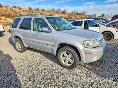 Czwarte zdjęcie samochodu z boku: 2006 MERCURY MARINER HEV VIN:4M2YU98H16KJ09077 - miniatura