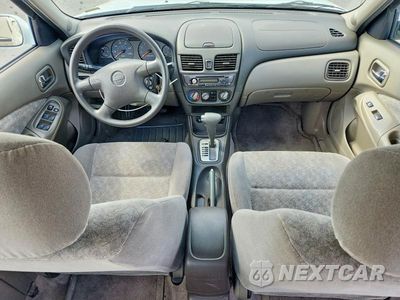 Zdjęcie 8 z 13 samochodu: 2002 NISSAN SENTRA XE VIN:3N1CB51D52L686339 - miniatura