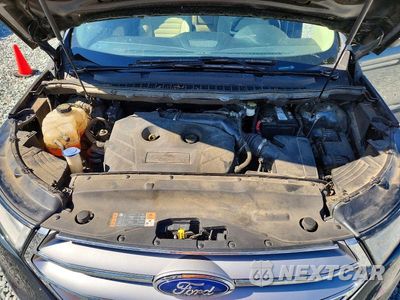 Zdjęcie 12 z 13 samochodu: 2015 FORD EDGE SEL VIN:2FMTK3J98FBB24770 - miniatura