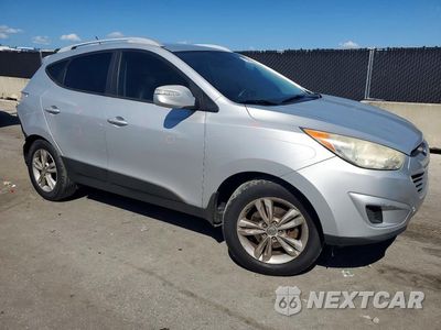 Czwarte zdjęcie samochodu z boku: 2012 HYUNDAI TUCSON GLS VIN:KM8JU3AC0CU389220 - miniatura