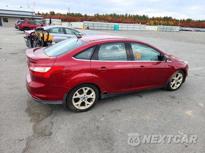Trzecie zdjęcie samochodu z tyłu: 2014 FORD FOCUS TITANIUM VIN:1FADP3J24EL215133 - miniatura