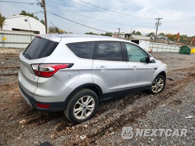 Trzecie zdjęcie samochodu z tyłu: 2017 FORD ESCAPE SE VIN:1FMCU9GD2HUC41380 - miniatura