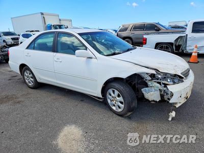 Czwarte zdjęcie samochodu z boku: 2002 TOYOTA CAMRY LE V6 VIN:JTDBF32KX20021612 - miniatura