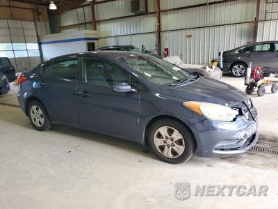 Czwarte zdjęcie samochodu z boku: 2014 KIA FORTE LX VIN:KNAFK4A65E5048289 - miniatura