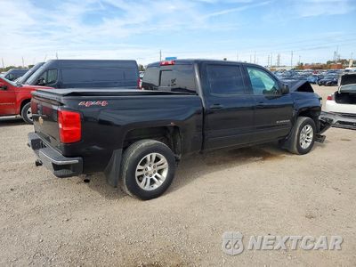 Trzecie zdjęcie samochodu z tyłu: 2017 CHEVROLET SILVERADO K1500 LT VIN:3GCUKREC1HG425656 - miniatura
