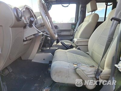 Zdjęcie 7 z 13 samochodu: 2007 JEEP WRANGLER SAHARA VIN:1J4GB59147L143196 - miniatura
